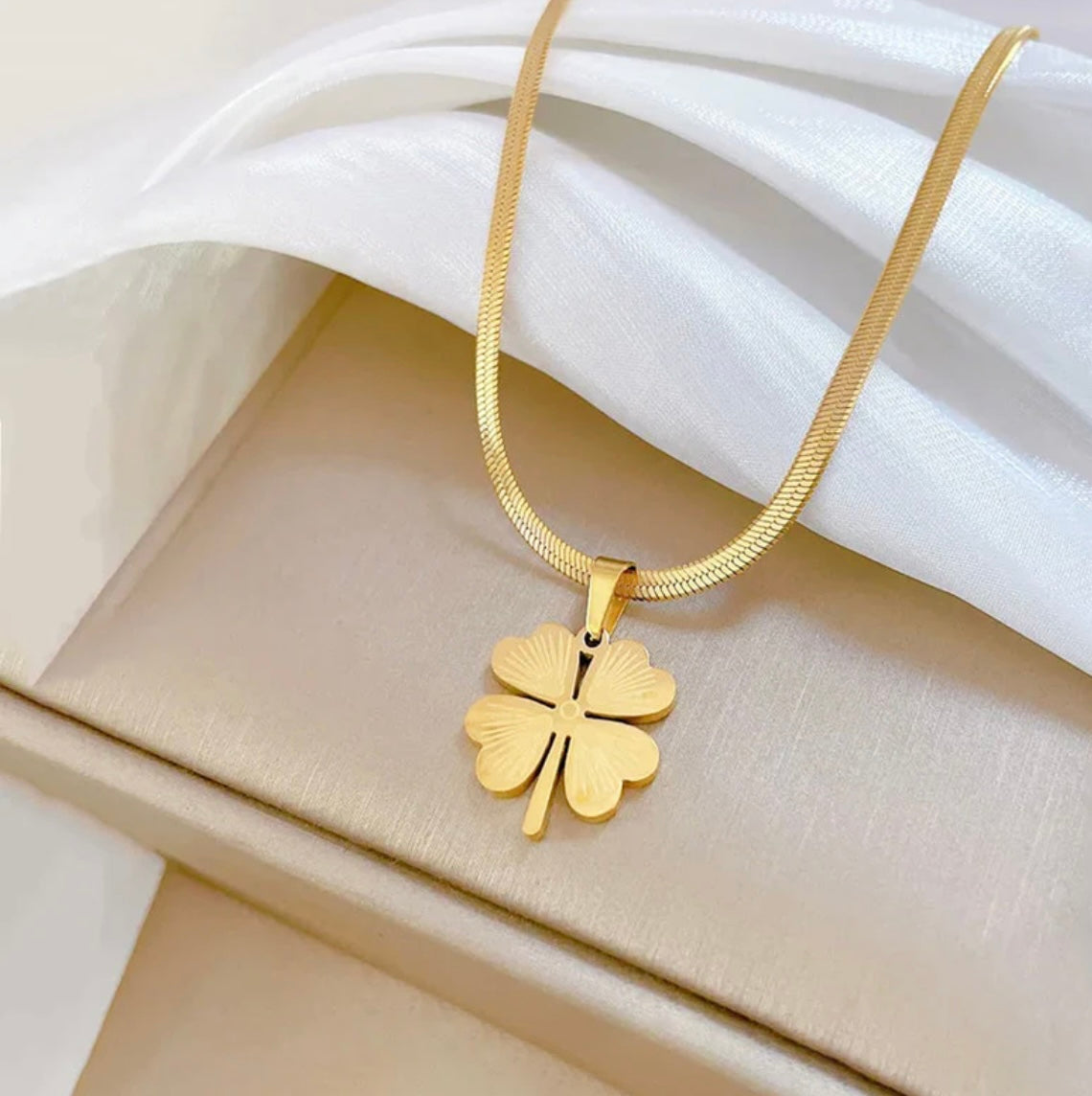 Golden clover necklace
